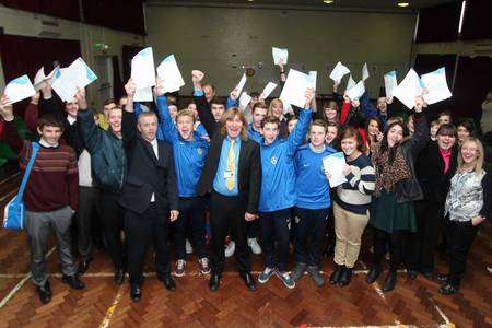 Teachers and pupils celebrate the exam results upgrade at The Isle of Sheppey Academy