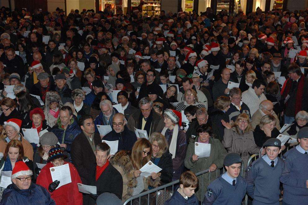 The huge crowd which gathered for last year's community carol singing in Canterbury city centre