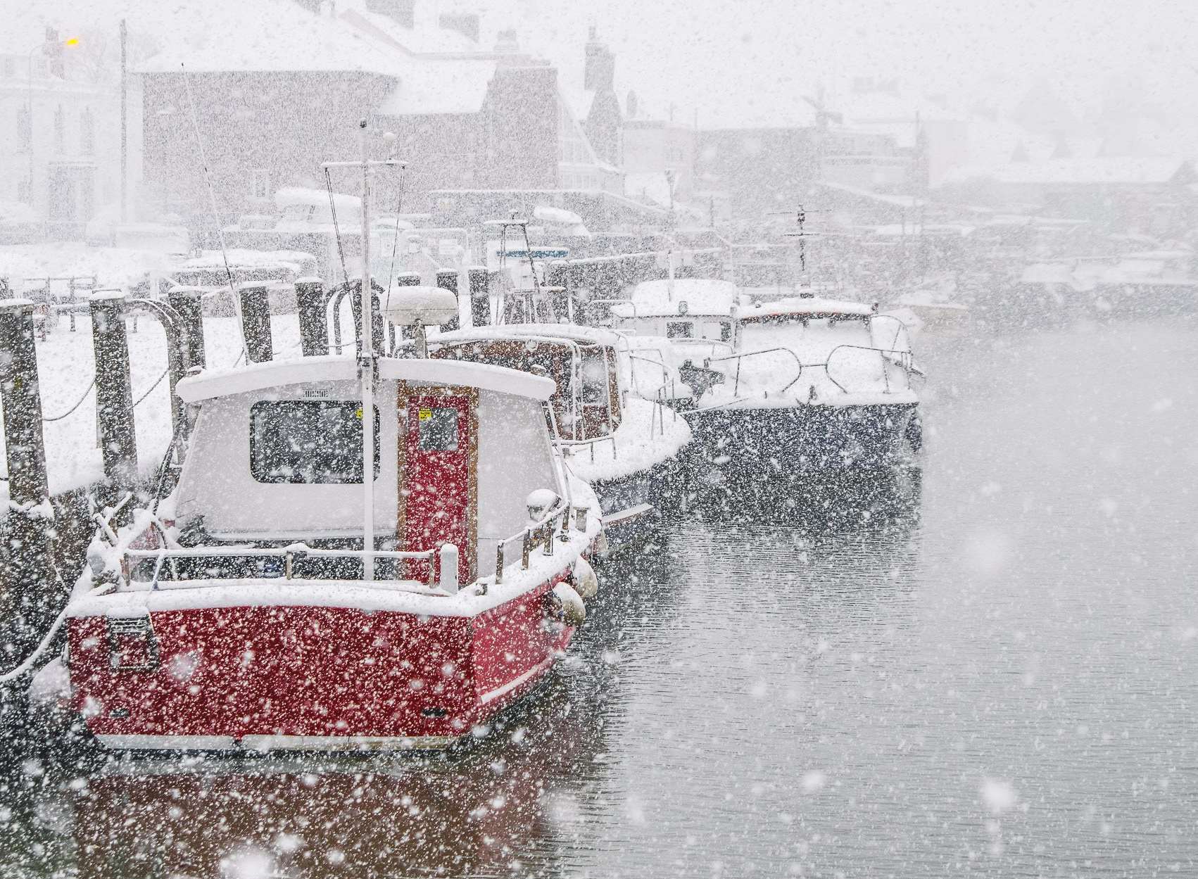Snow-bound boats at Queenborough on Sheppey. Picture: Julius Matikas