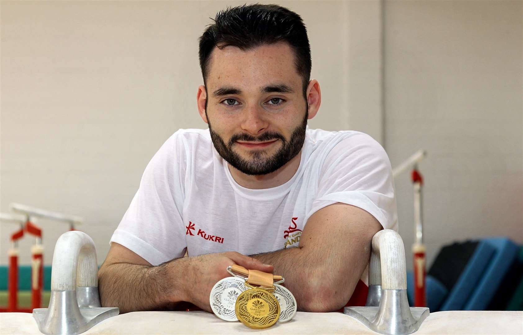 Gymnast James Hall with his medals from the Commonweath Games in Australia four years ago. Picture: Sean Aidan
