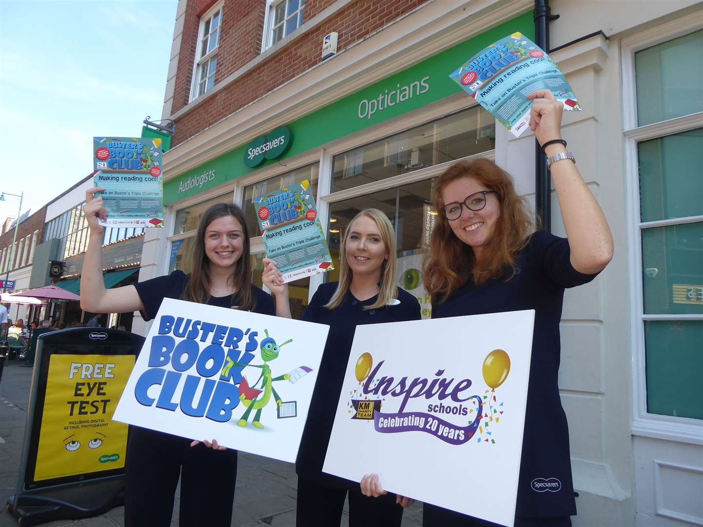Aine Tainsh, Chloe McGregor and Jess Homes of Specsavers Canterbury branch promote Busters Book Club. (16017387)