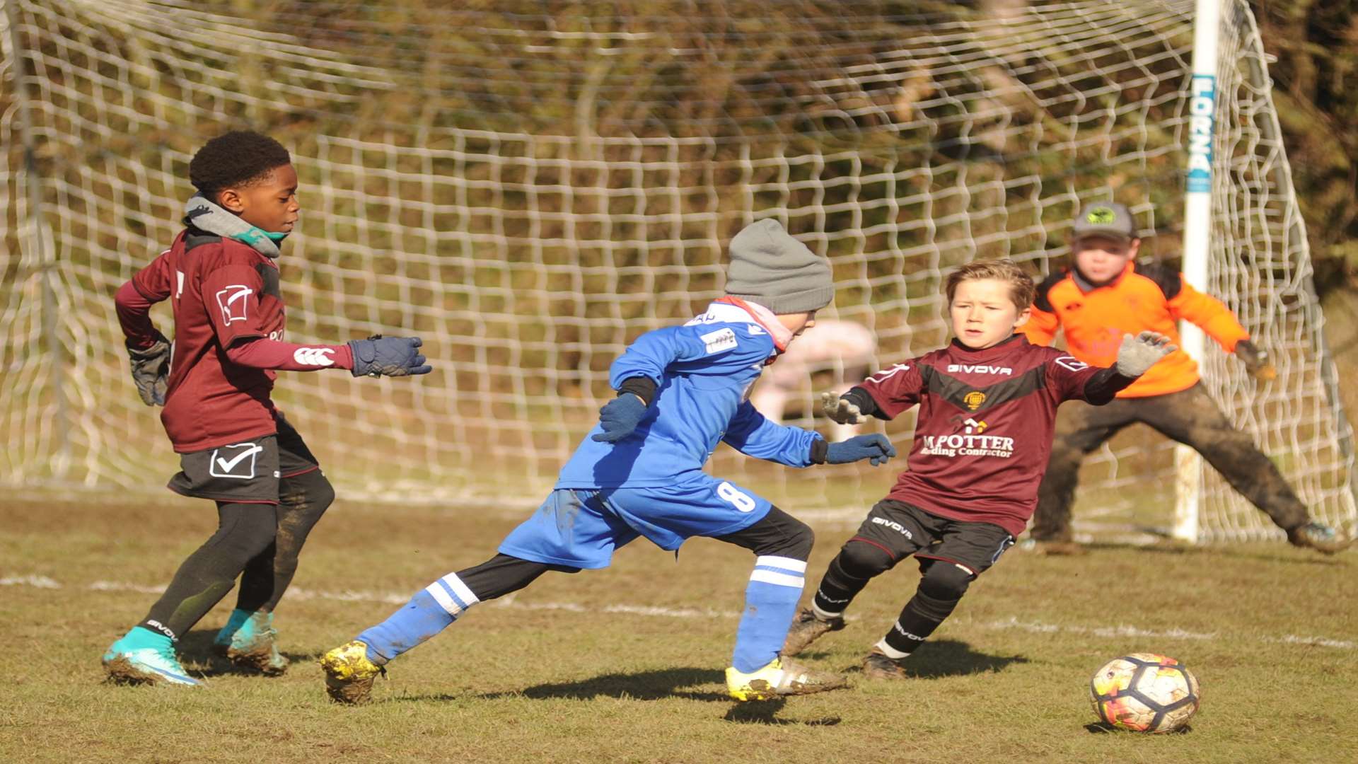 Match action as KFU Woodpecker under-8s take on Sheerness East Youth under-8s Picture: Steve Crispe