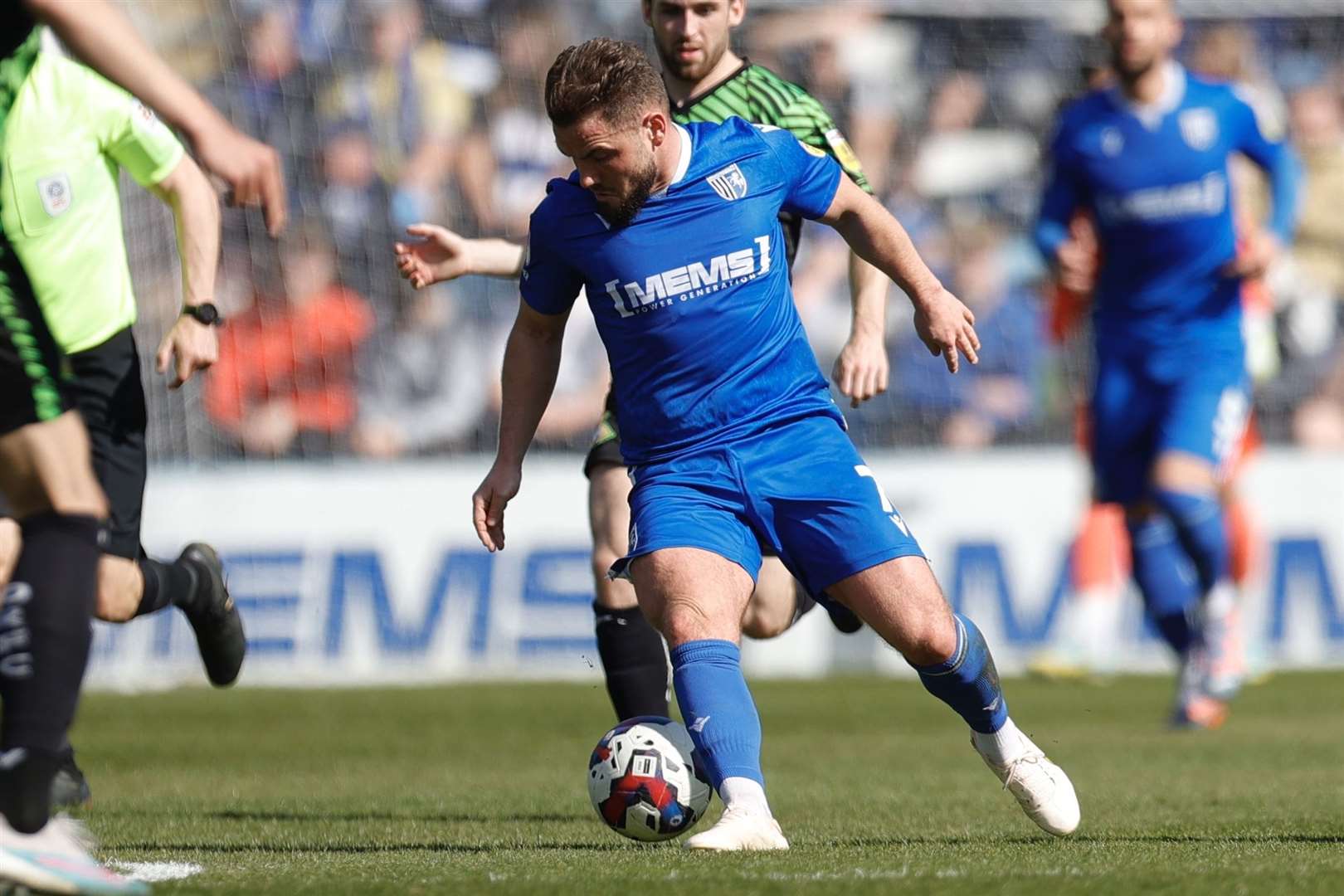 Alex MacDonald with the ball for Gillingham against Doncaster at Priestfield