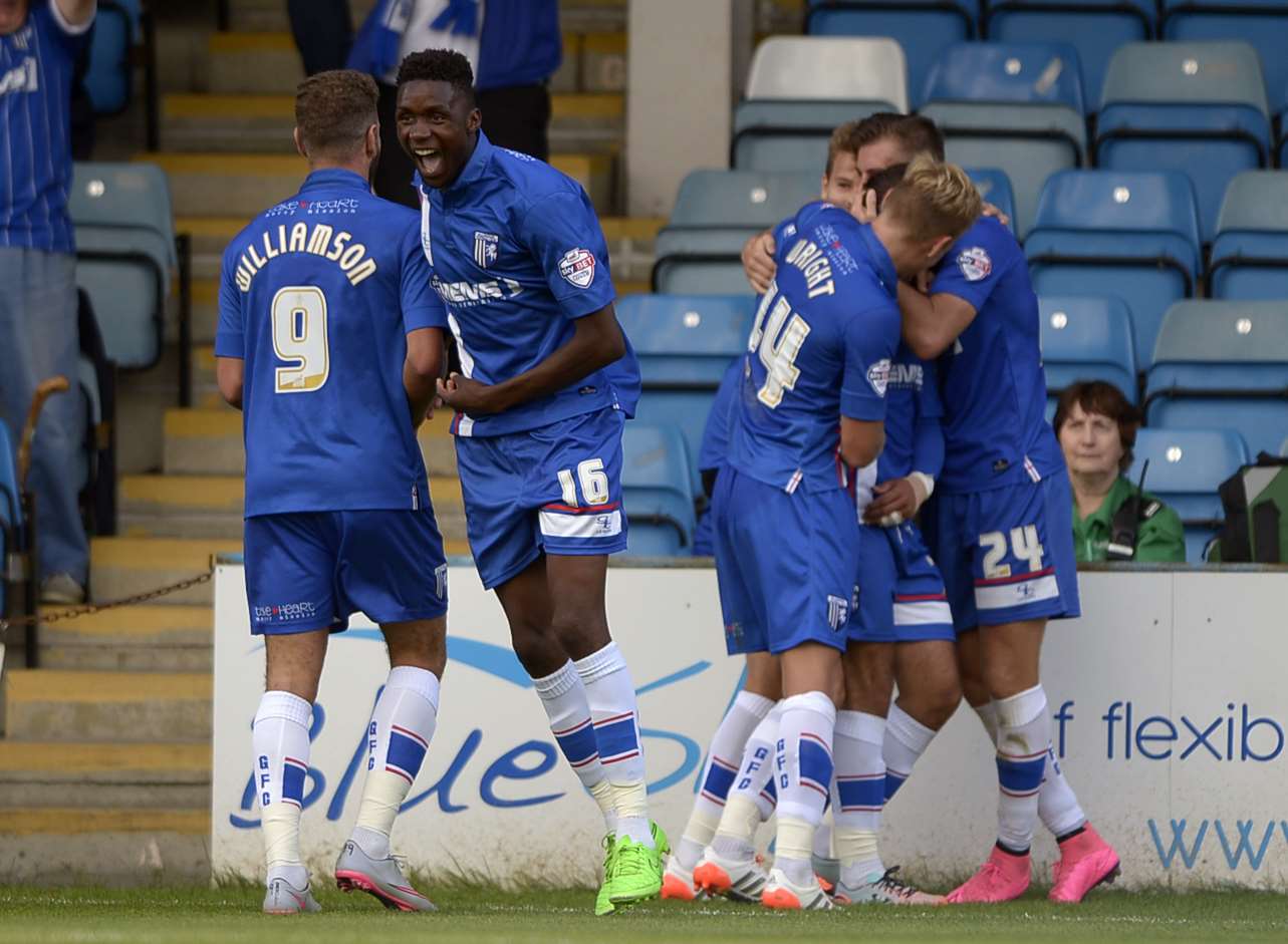 Gillingham players celebrate their second goal Picture: Barry Goodwin