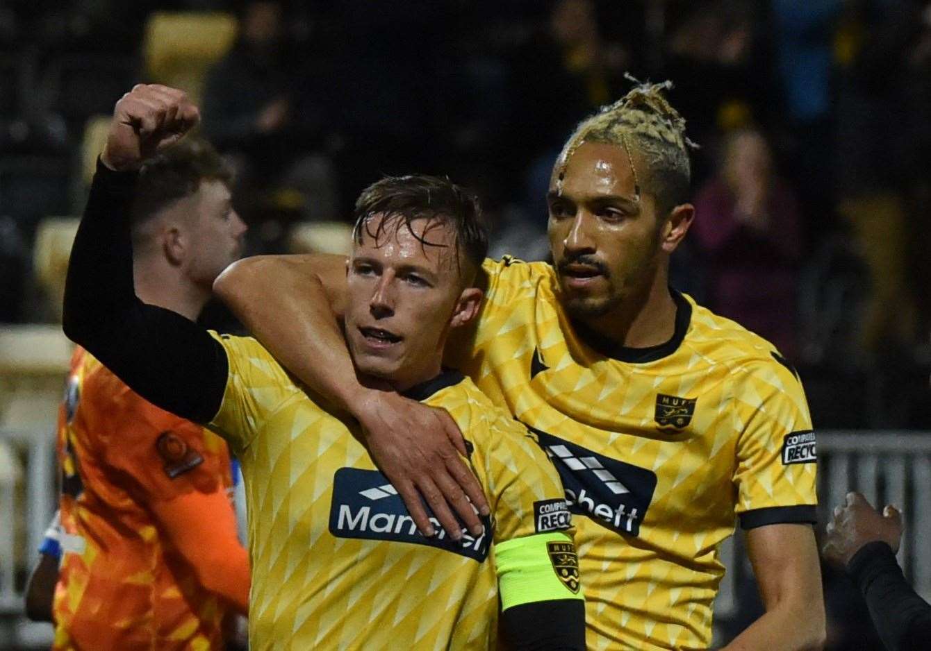 Matt Bentley, right, celebrates with goalscorer Sam Corne after Maidstone take the lead against Chelmsford. Picture: Steve Terrell