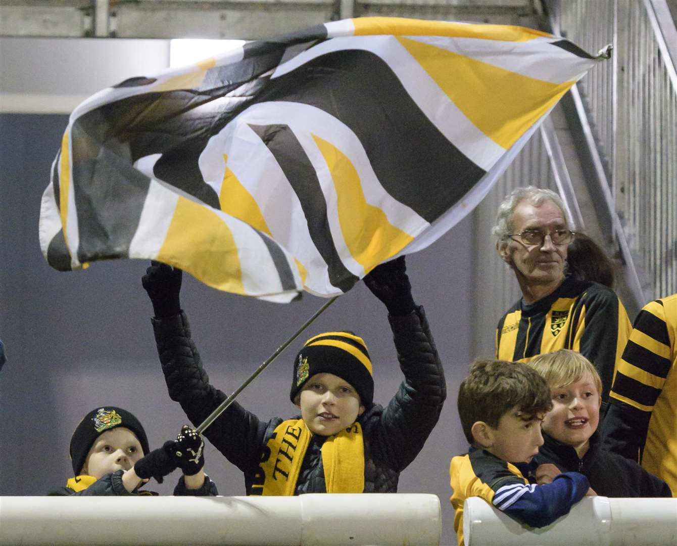Young fans wave the flag after Maidstone's win Picture: Andy Payton