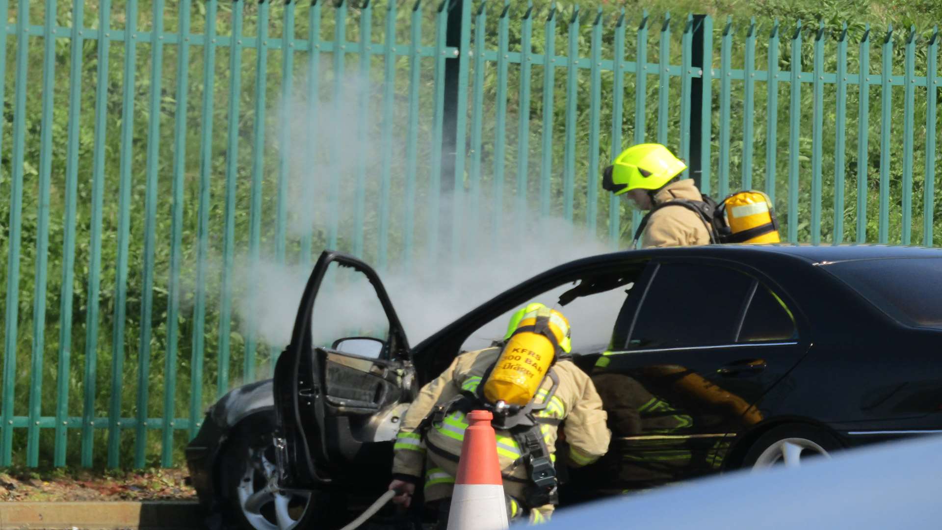 The car was on fire at the Park Farm Tesco store in Ashford