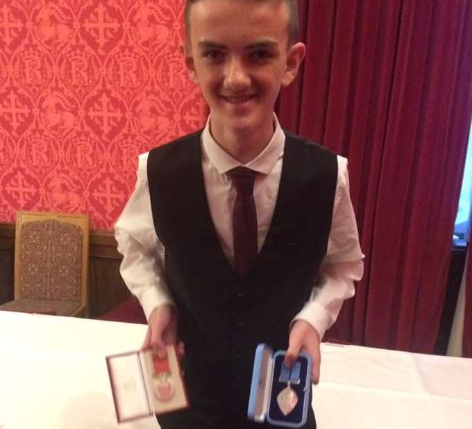 Jonjo and his medals at the ceremony in Westminster. Picture: Jonjo Heuerman