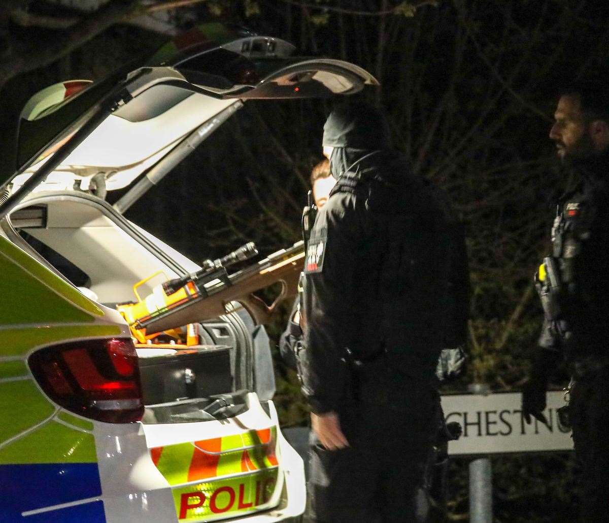 Officers were seen taking a weapon from the back of a car in Maidstone's Park Wood estate. Pictures UKNIP