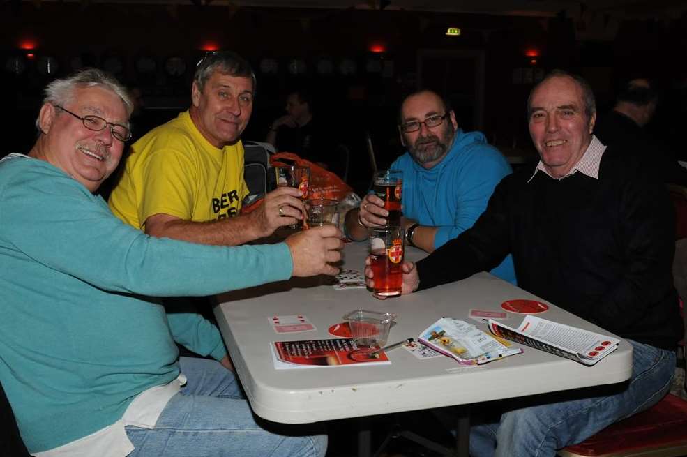 Stanley Ballroom, St George Hotel, Gundolph Road, Chatham. Medway beer festival. L-R: Tony, John, Colin and Martin have a beer