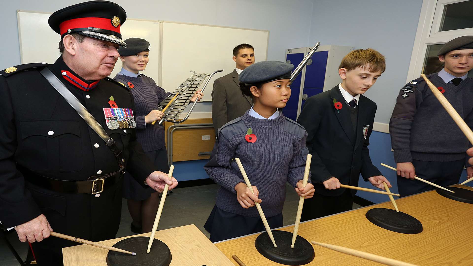 Maj (Retd) Dennis Bradley, deputy lieutenant for Kent, drumming with the air cadets from 2316 (Sheppey)