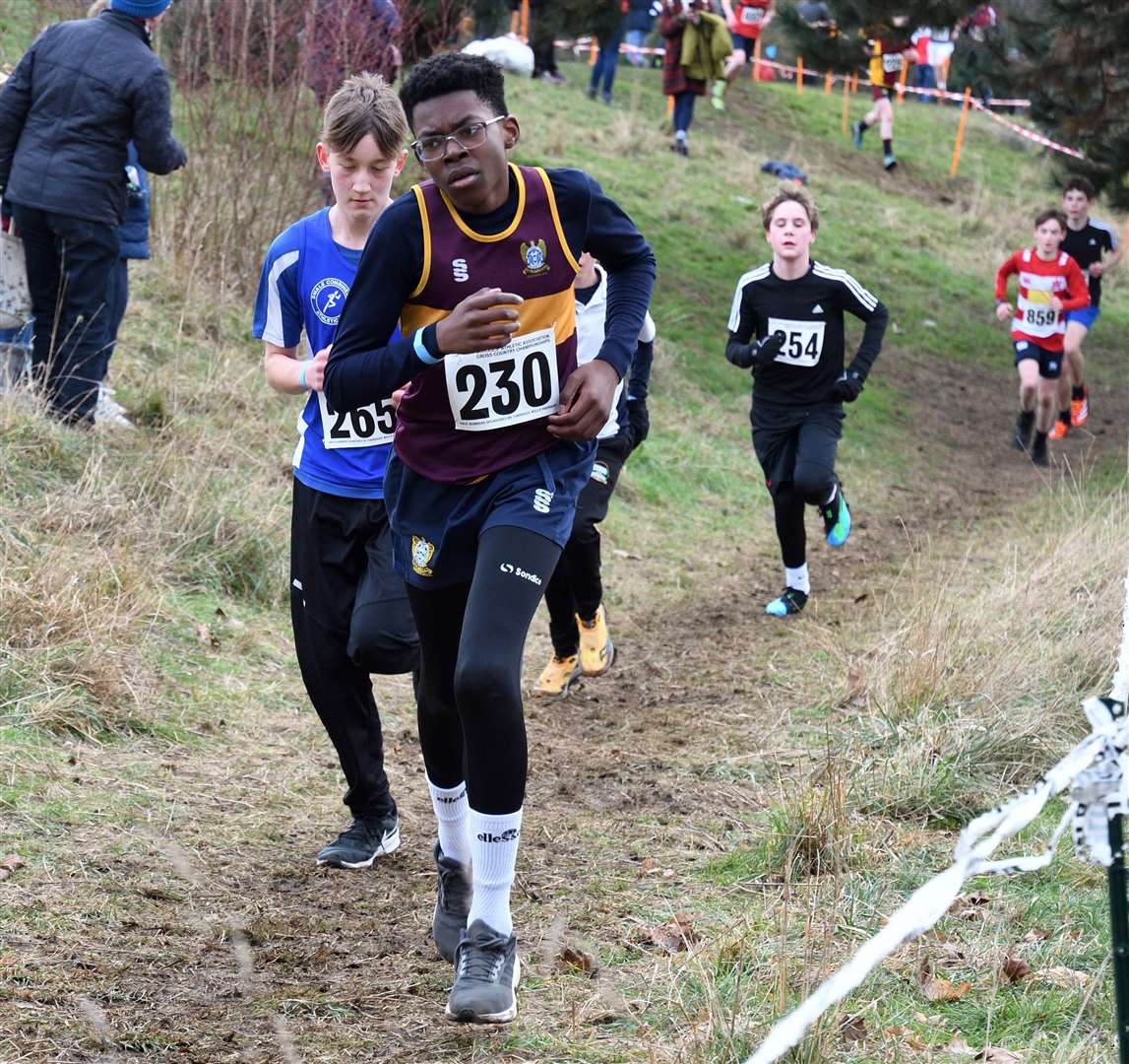 Kaife Adetunji (No.230) making strides in the junior boys’ race. Picture: Simon Hildrew