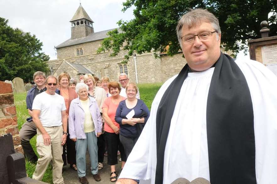 The Rev Stephen Gwilt with parishioners at All Saints Church, Allhallows