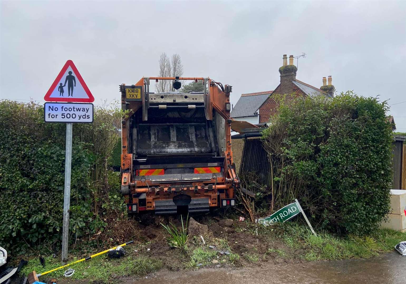 A bin lorry has ploughed into a bush after a crash in Langley, near Maidstone, this morning. Picture: Chris Yorke