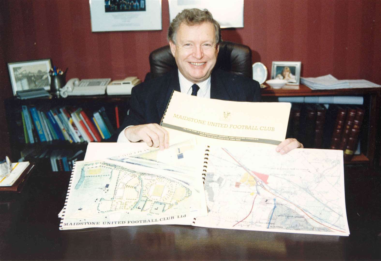 Jim Thompson with plans for Maidstone's proposed stadium at Hollingbourne in 1991