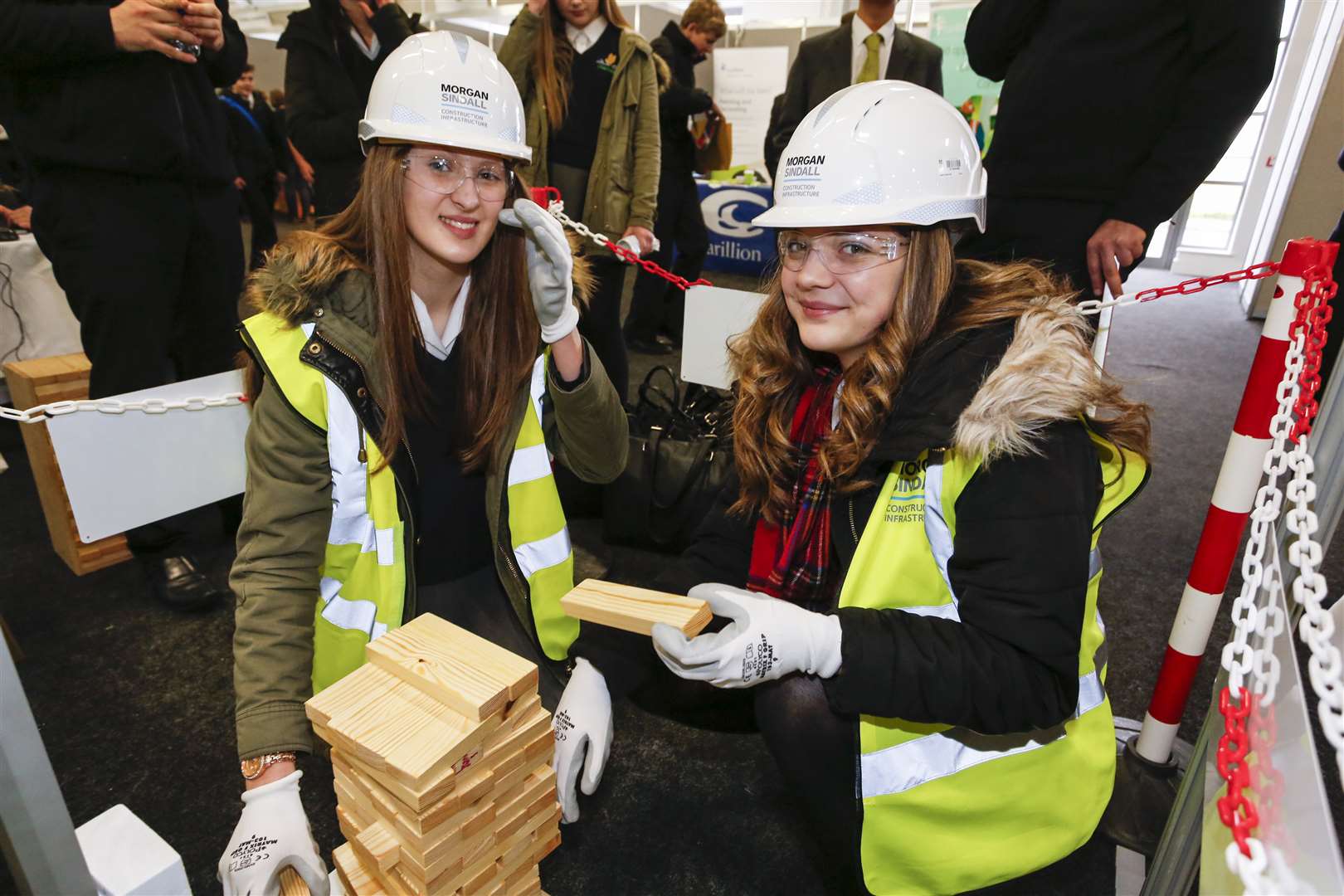 Niamh Sindall, left, and Jasmine Cooper of Mapleston Noakes School on the Morgan Sindall stand at KentChoices Live 2016