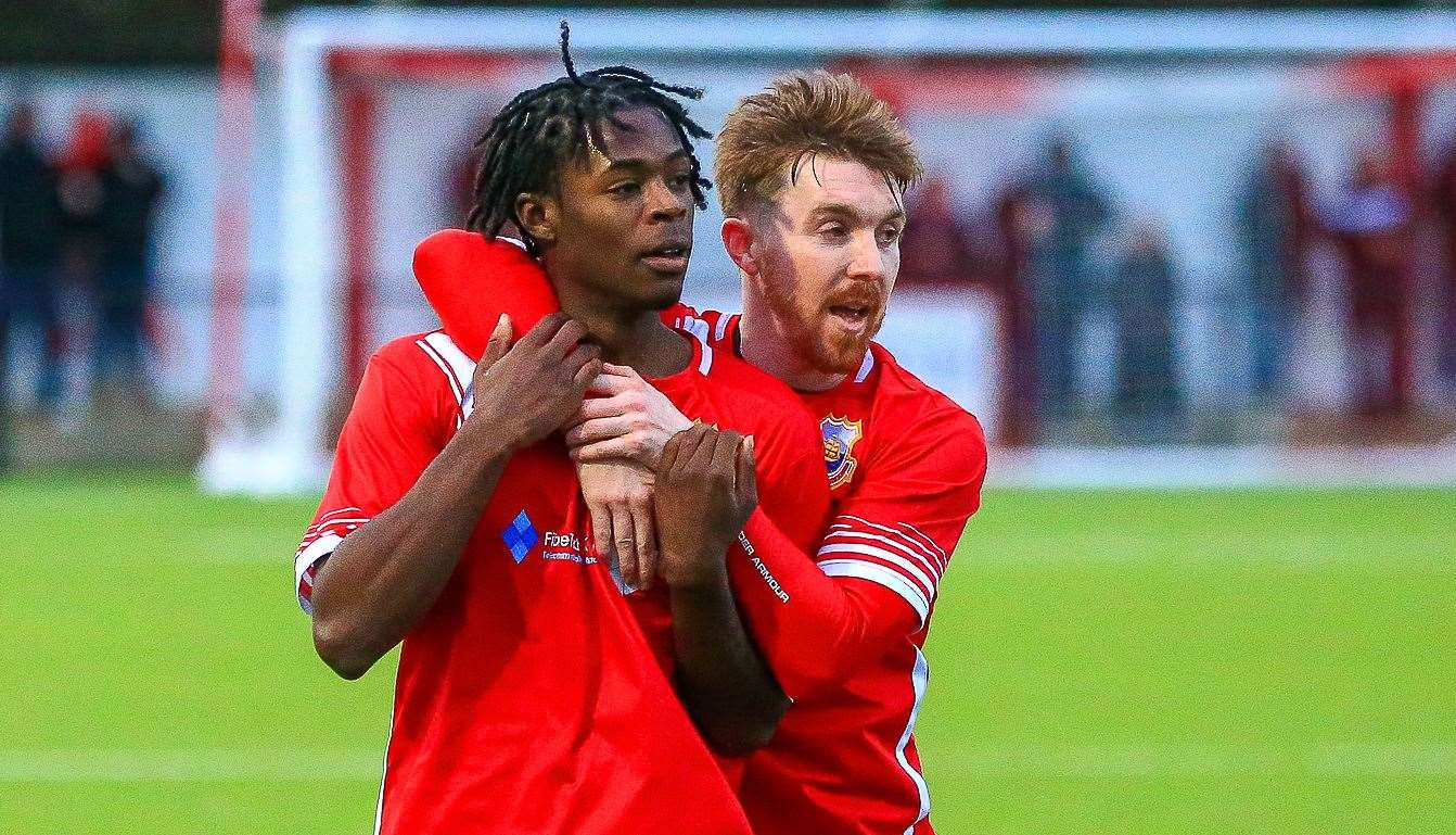 Jake Mackenzie celebrates with Whitstable team-mate Victor Aiyelabola. Picture: Les Biggs