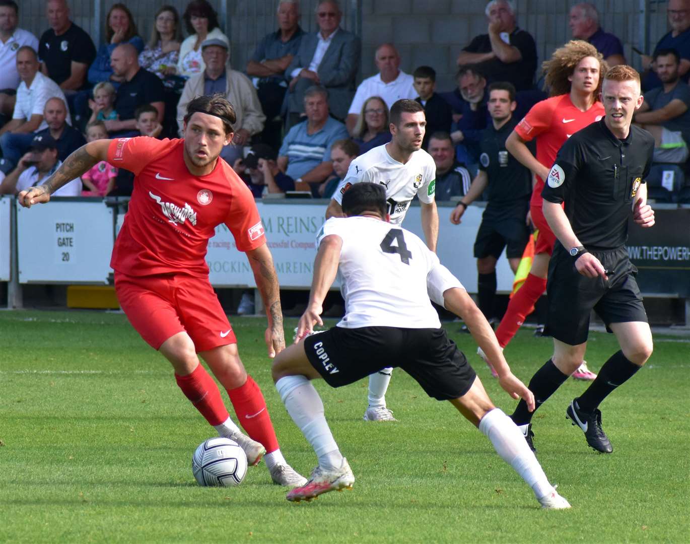 Darren Oldaker in action for Hythe in the FA Cup at Dartford last season Picture: Randolph File