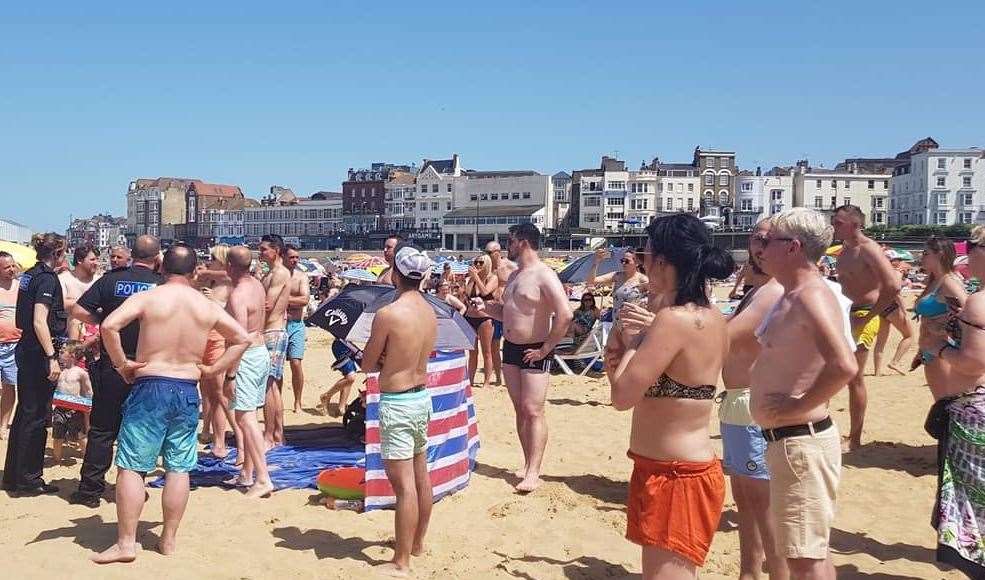 The row erupted at Margate Sunny Sands beach. There is no suggestion the people pictured were involved in the brawl. Picture: Tammy-Louise Layne