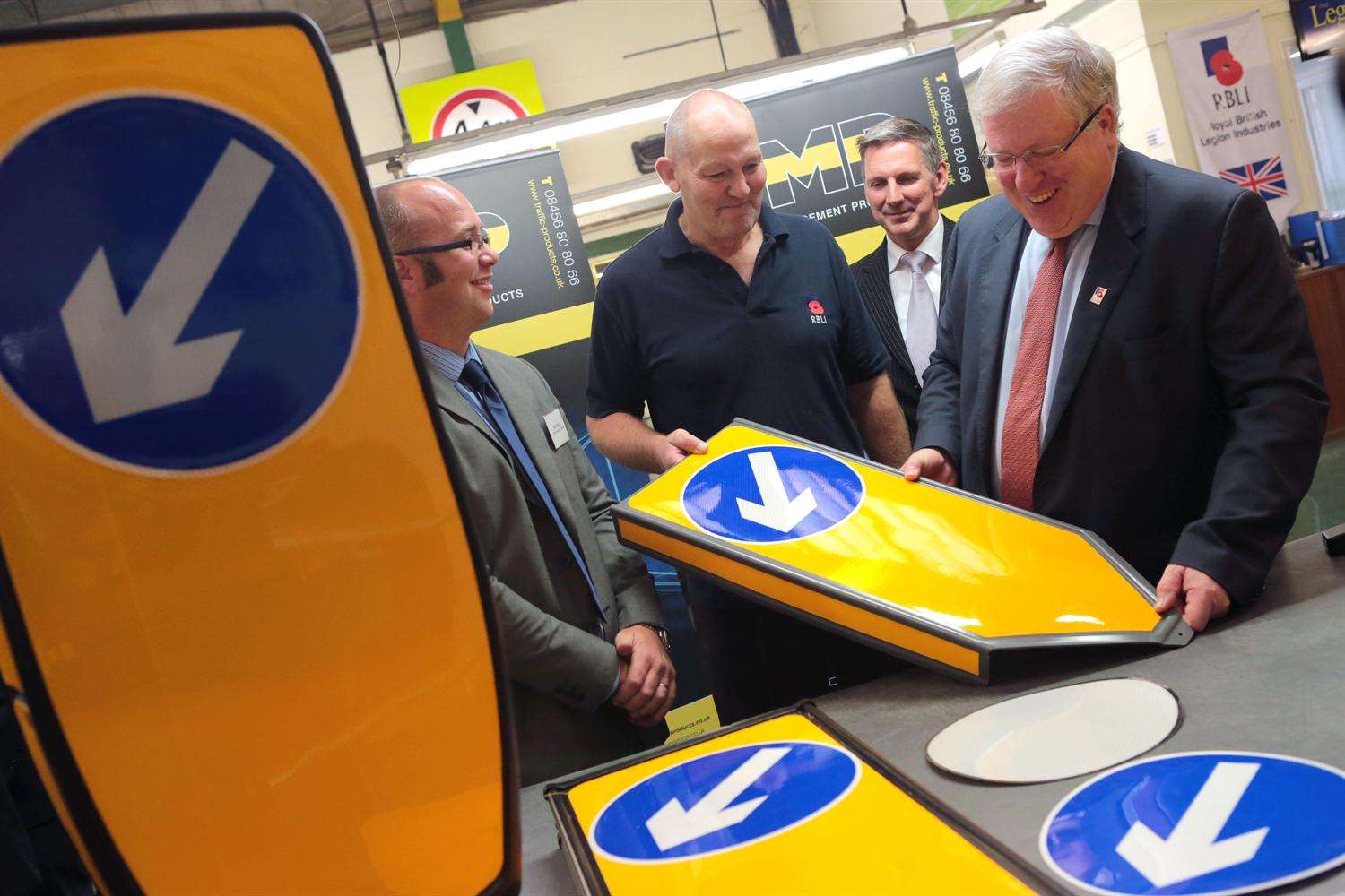 Transport Secretary Patrick McLoughlin visits Royal British Legion Industries to unveil new £350,000 modernisation of its road and rail signs factory