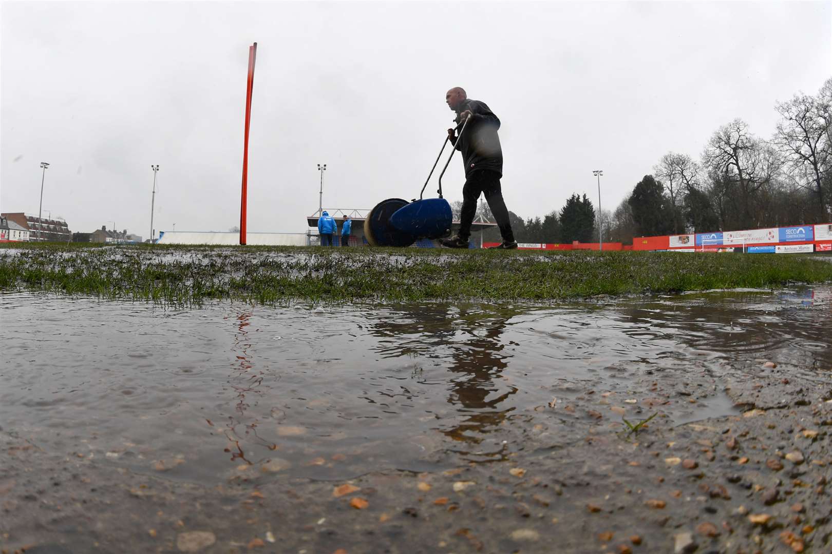 Welling groundsman Barry Hobbins at work on the pitch. Picture: Keith Gillard