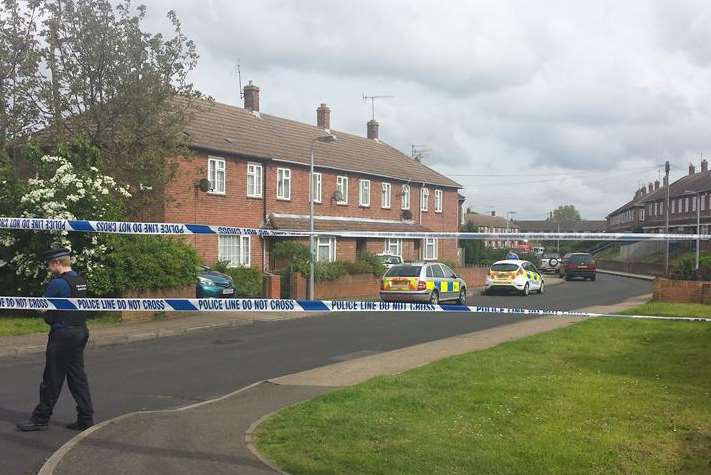 Police at the scene of the four-hour siege where Christopher Smith was detained