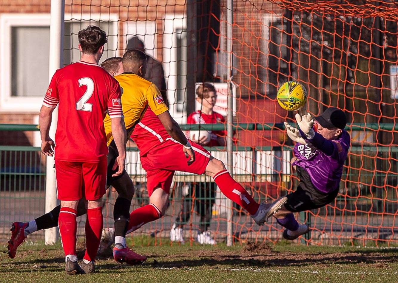 Whitstable are denied by home keeper Mitch Bromage during their 3-1 defeat at Three Bridges. Picture: Les Biggs