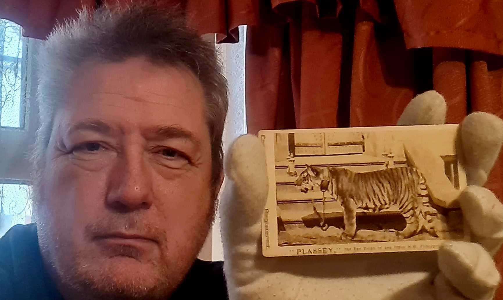 Phil Eyden of Dover's Western Heights Preservation Society with the photograph of the tiger