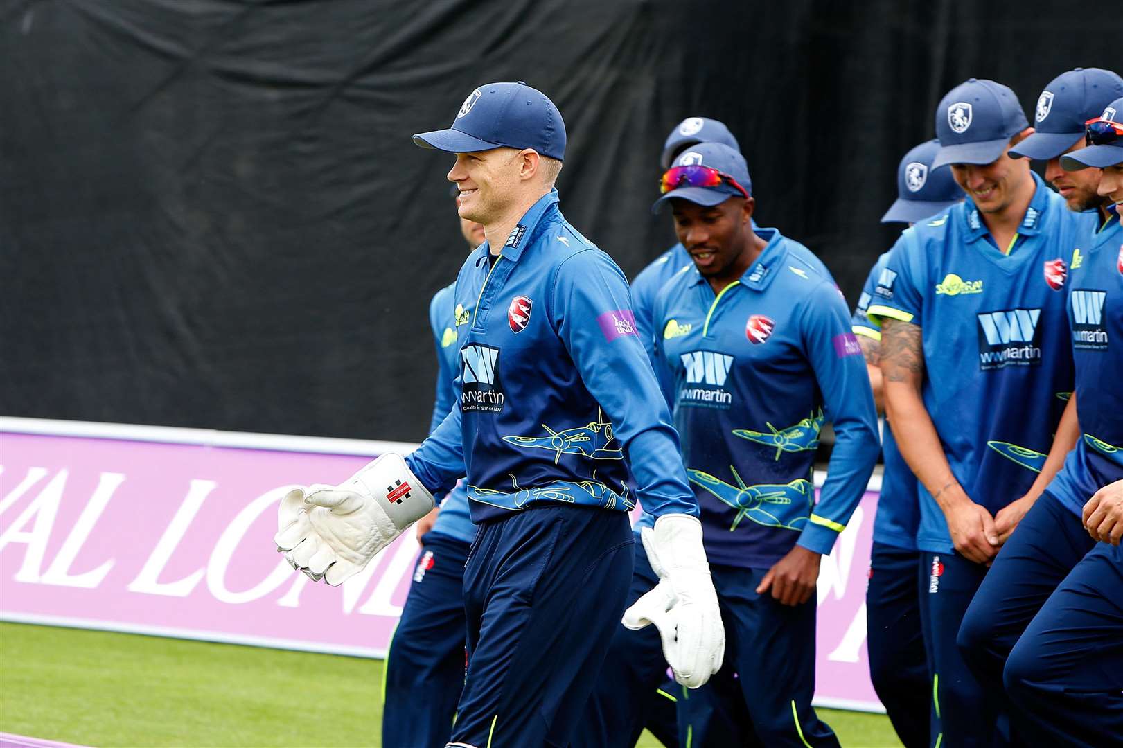 Sam Billings leads out his Kent side. Picture: Andy Jones