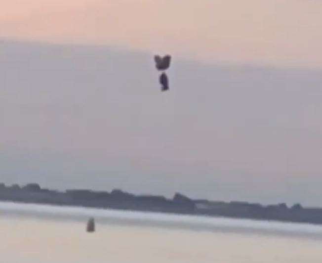 Mystery parachute landing in the sea off Minster on the Isle of Sheppey