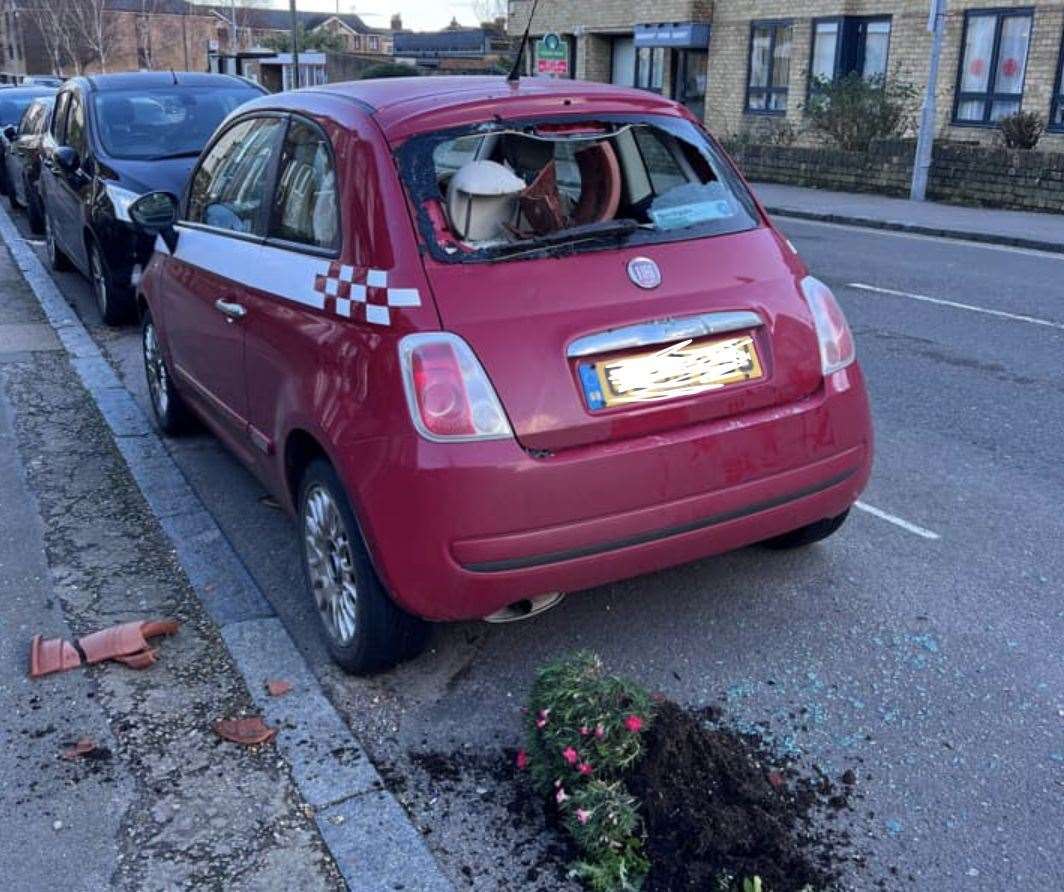 A car damaged in Newton Road, Faversham