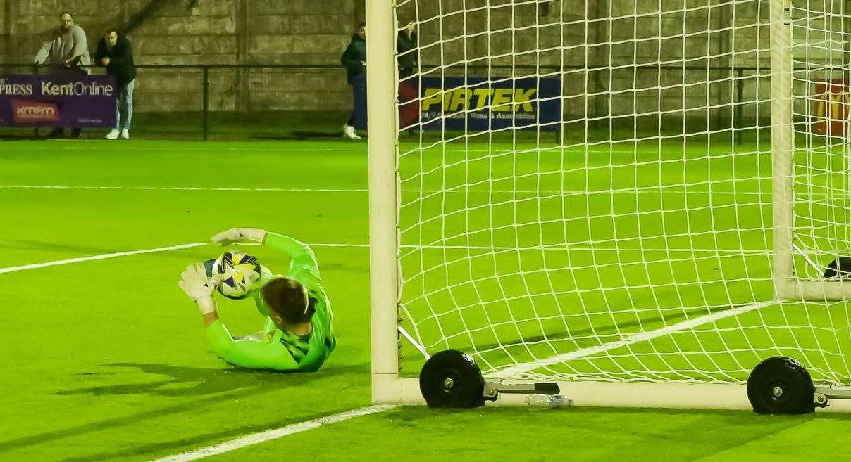 Kennington keeper Stefan Lawrence saves a penalty. Picture: Les Biggs