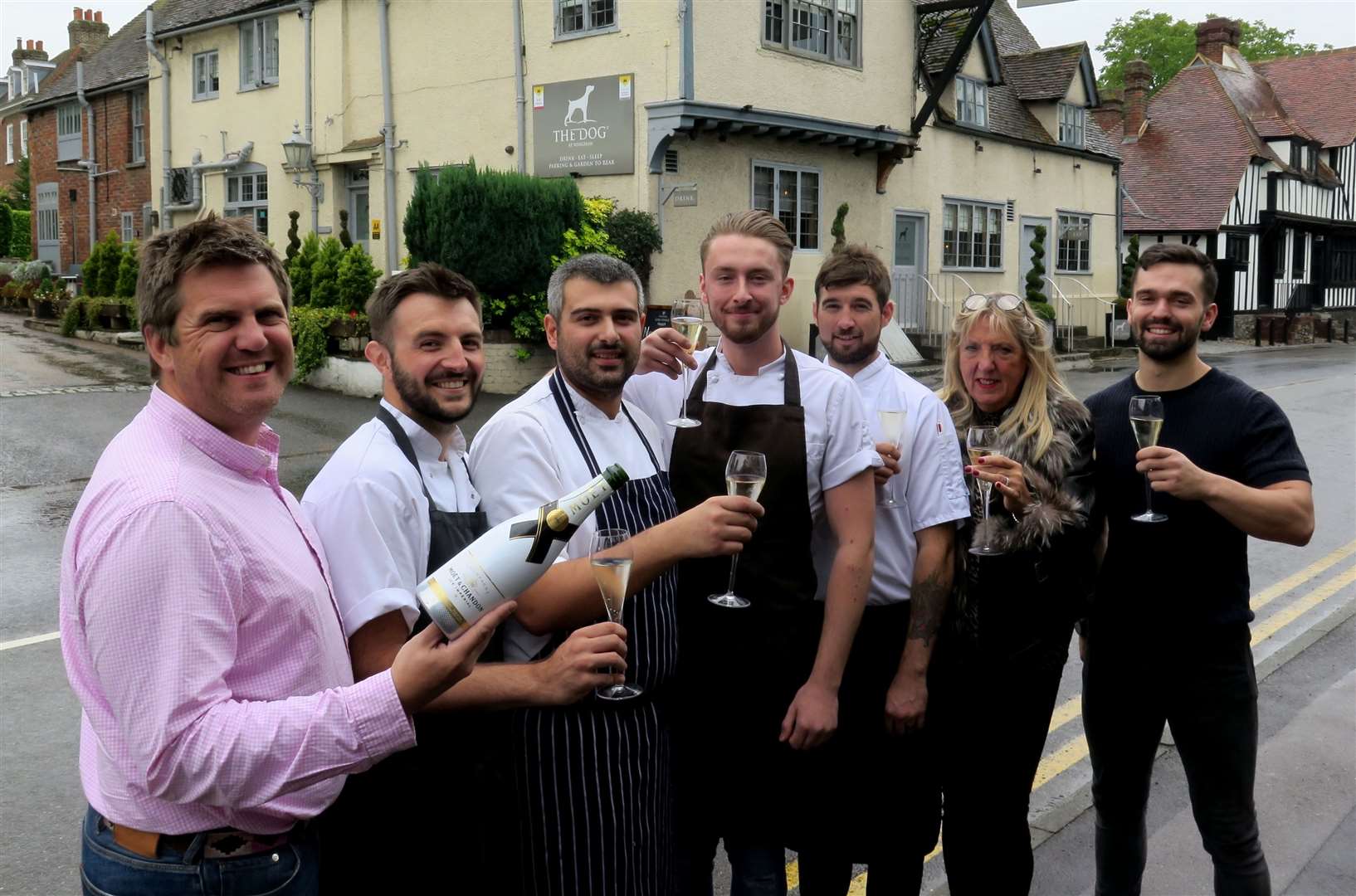 The award-winning team at The Dog with head chef Sam McClurkin (centre) and owners Marc Brigden and mum Marilyn Brigden