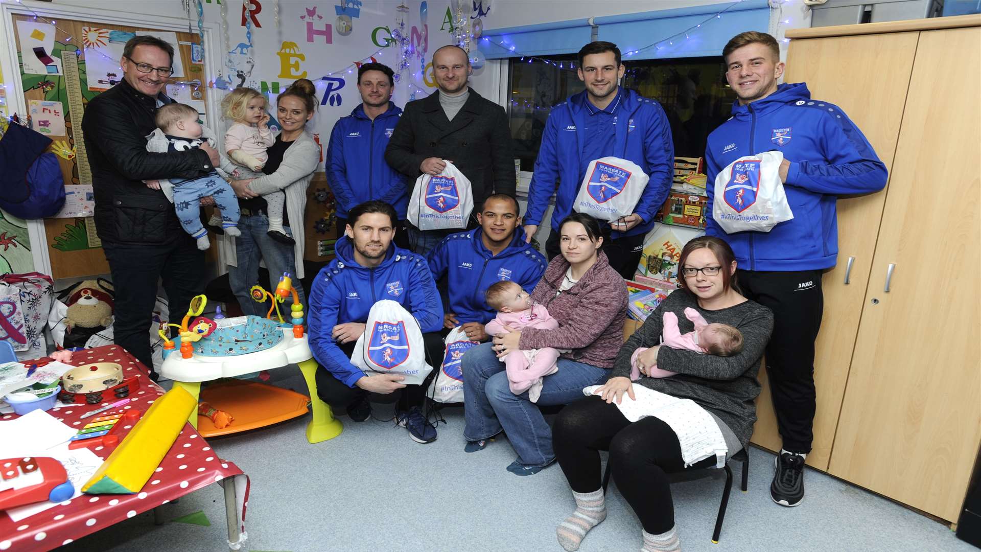 Margate manager Steve Watt, chairman Alistair Bayliss and several of the Gate squad visited young patients of the Rainbow Ward