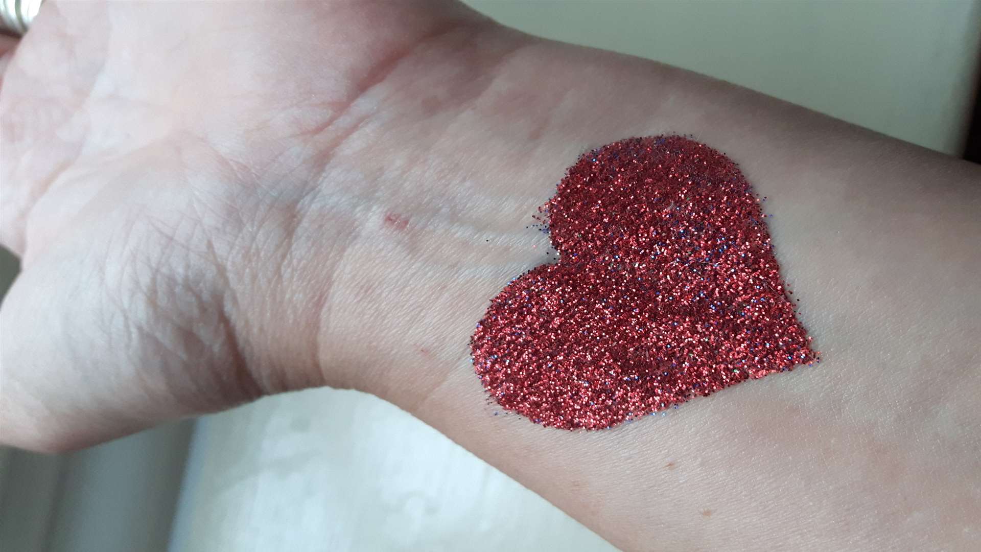 Glitter tattoos were a must at a four-year-old 's party