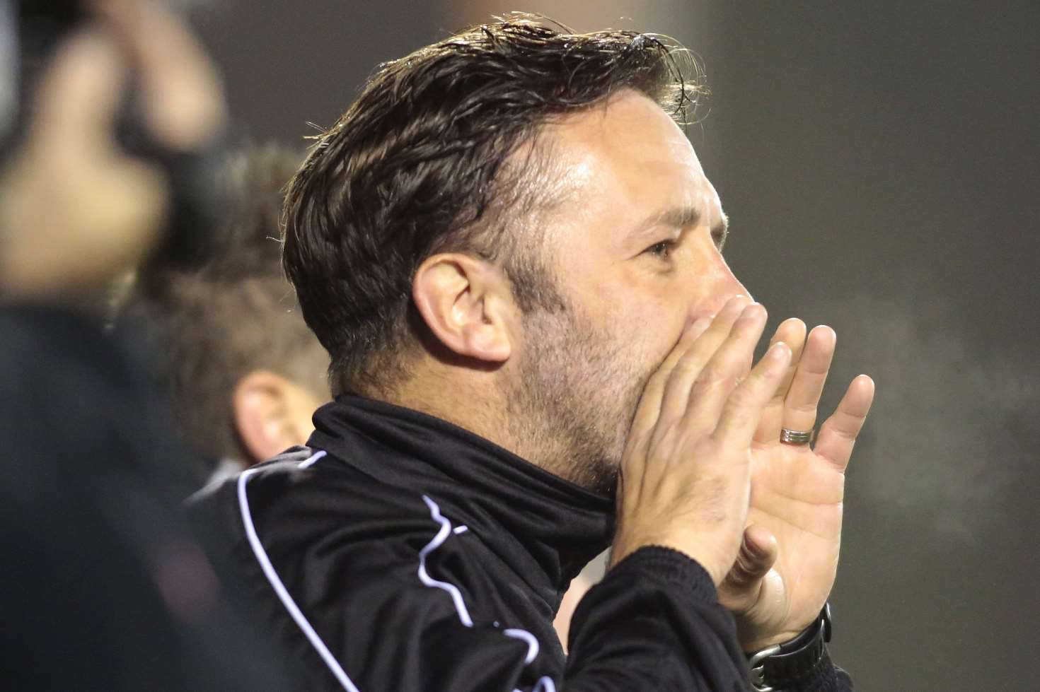 Jay Saunders shouts from the touchline during last season's FA Cup win over Stevenage. The Stones boss says his side must dig even deeper to beat Yeovil Picture: Martin Apps