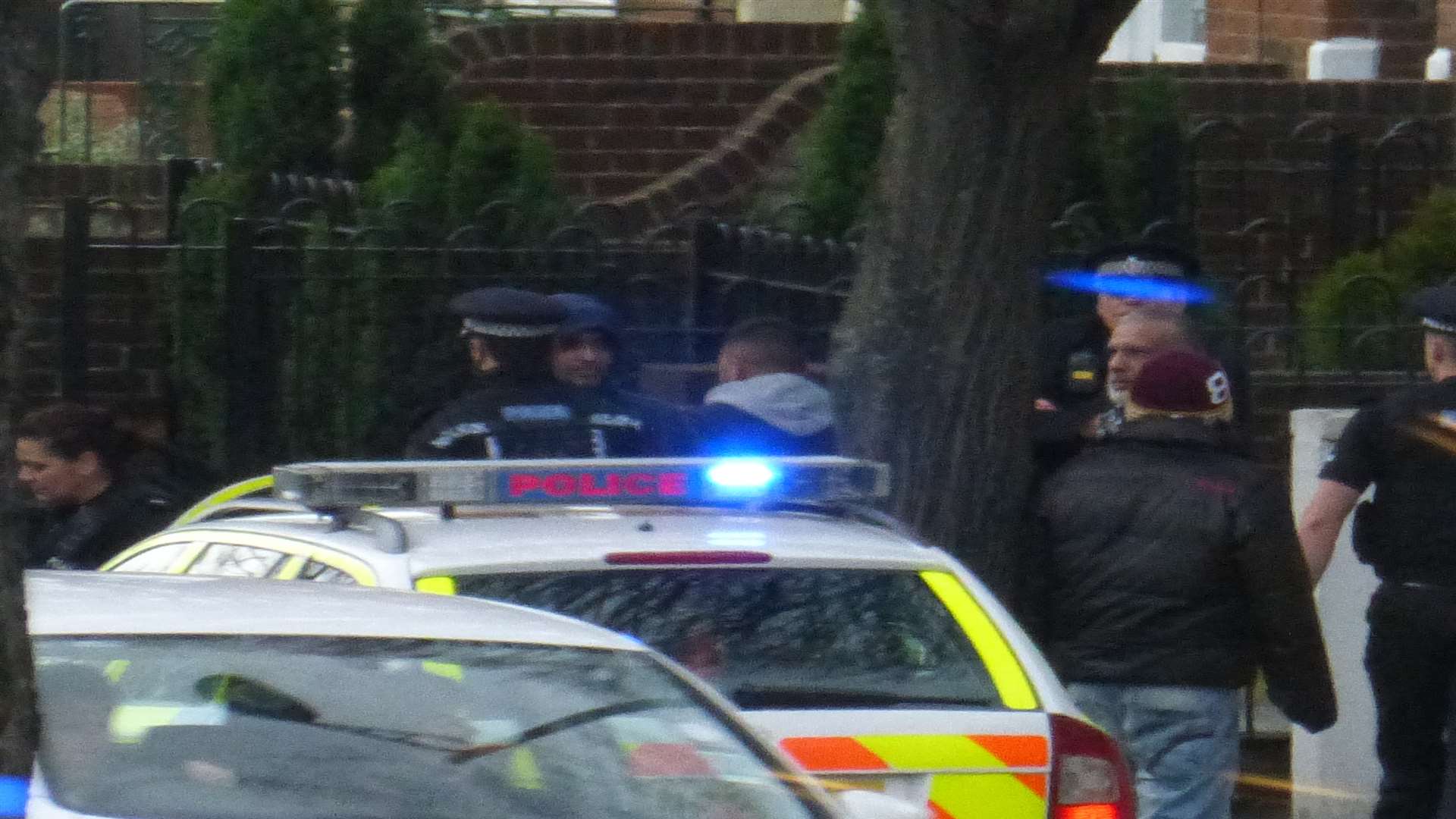 Police at the scene of a disturbance in New Road, Chatham