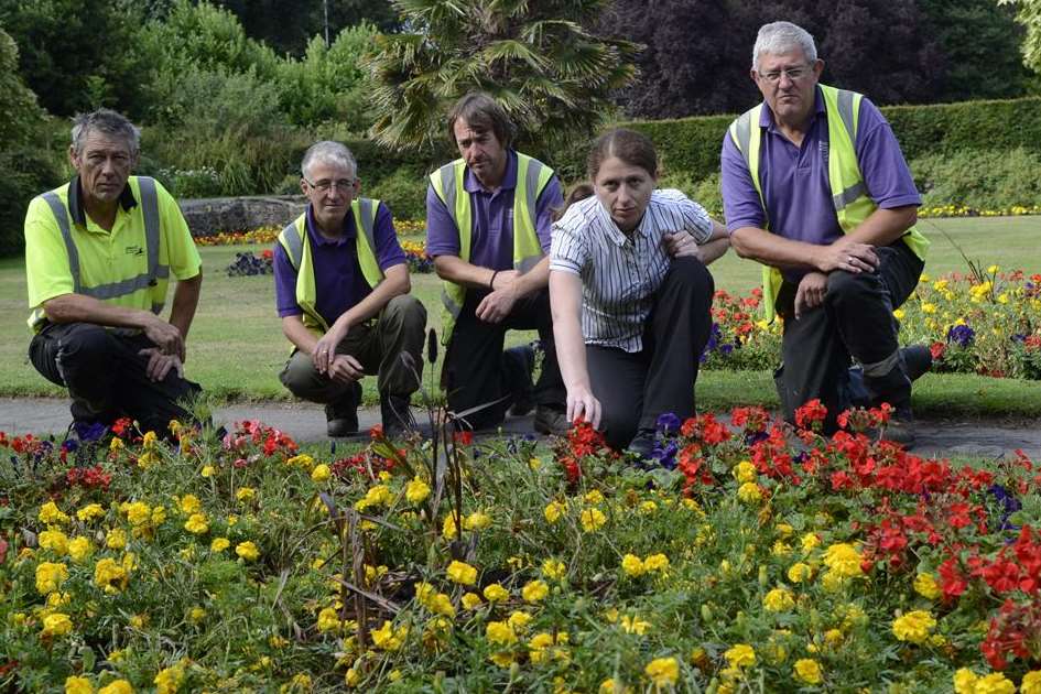 Charles Bramhall, Ian May, Chris Shone, Laura Pinkham and Andrew Friend next to one of the repaired flower beds