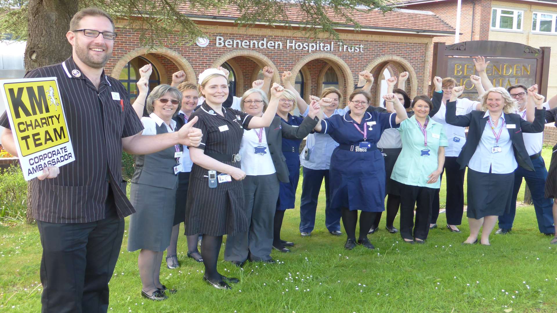 Phil Golding and staff at Benenden Hospital Trust gather to show their support for annual school science scheme the KM Bright Spark Awards. Nominations remain open until Friday, June 3.