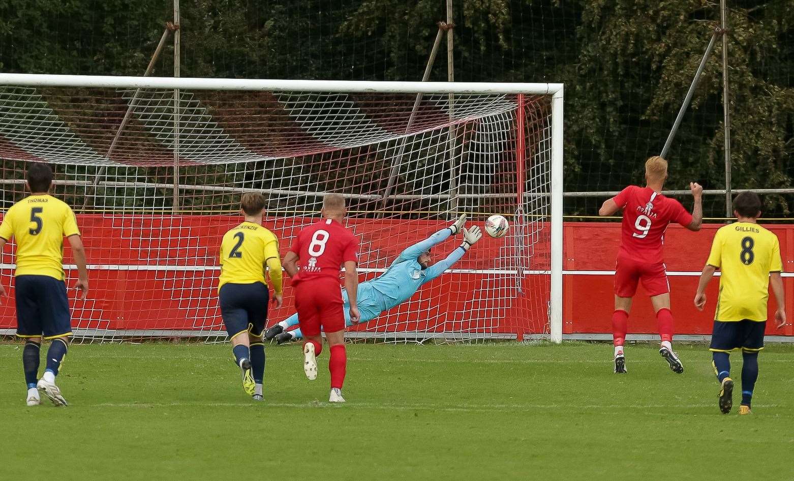 Dan Eason can’t quite keep out two-goal Trevor McCreadie’s penalty. Picture: Les Biggs