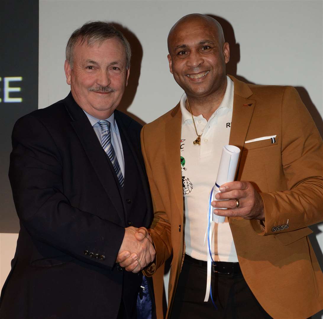 Cllr Alan Jarrett inducts Ian John-Lewis into the Hall of Fame at the Medway Sports Awards in 2018. Picture: Chris Davey