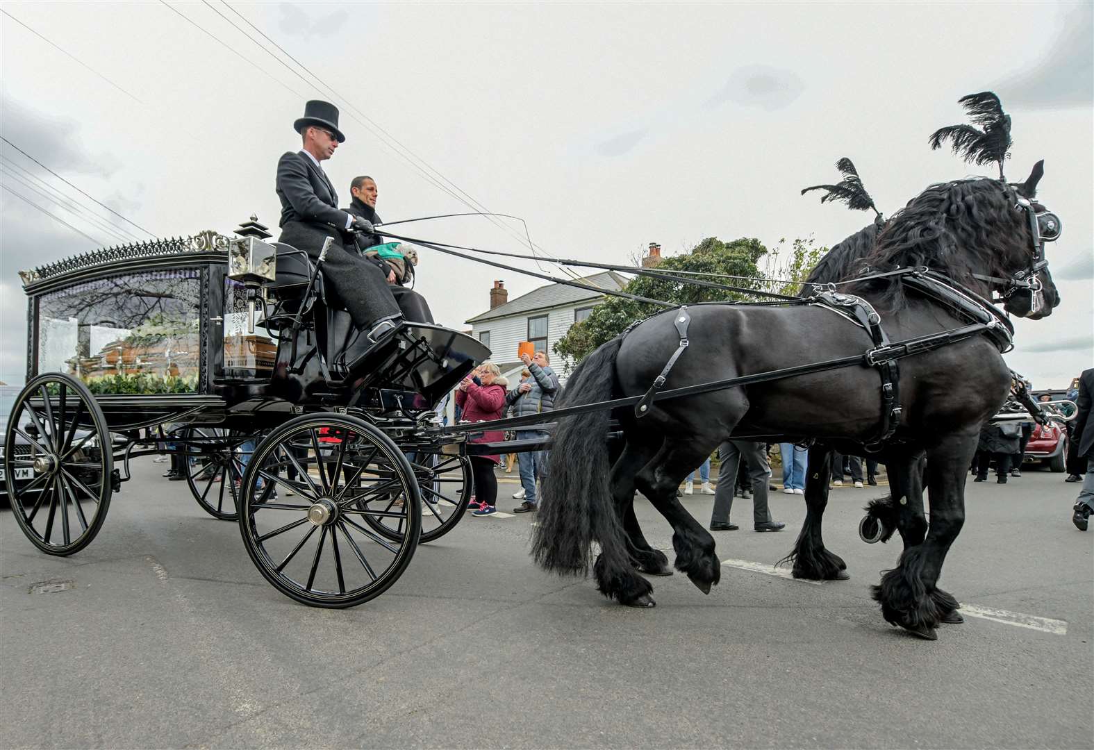 Hundreds of people gathered to watch the former Aldington resident’s funeral procession. Picture: Stuart Brock