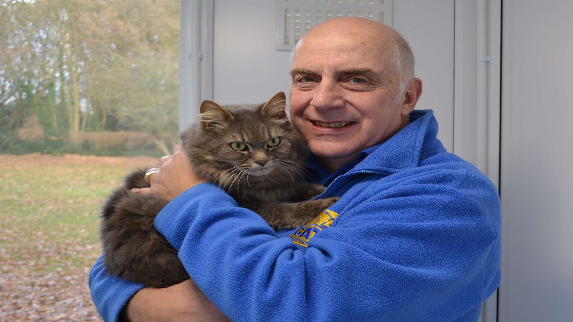 Regan with Adrian Ferne, manager at Cats Protections’ Bredhurst Adoption Centre. Picture: Cats Protection