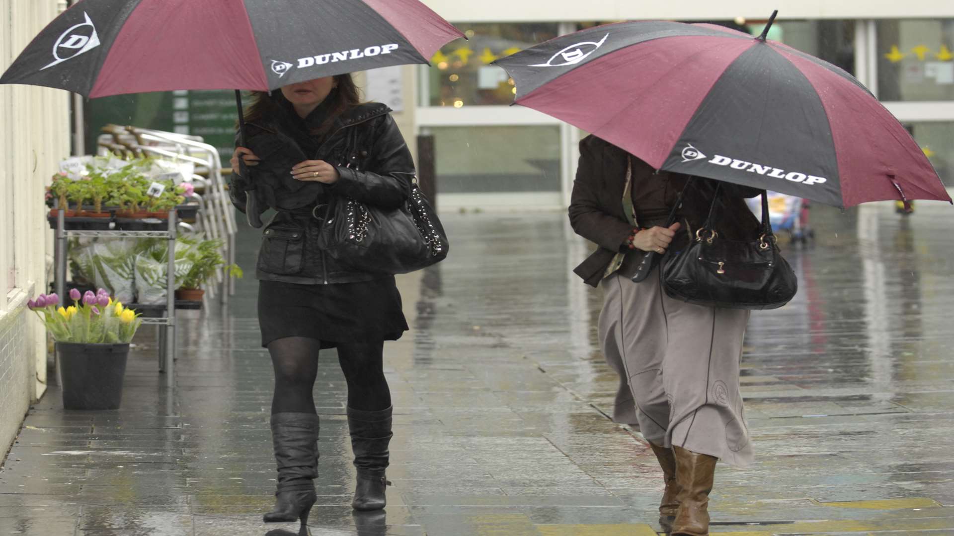 Shoppers braving the rain