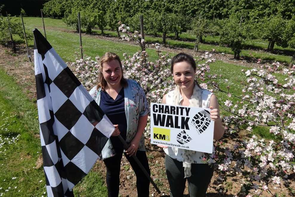 (From left) Moray Neame, communications executive for Britain's oldest brewer Shepherd Neame, and Kimberly Campion, development officer at Brogdale Collections in Faversham, support the KM Charity Walk 2014