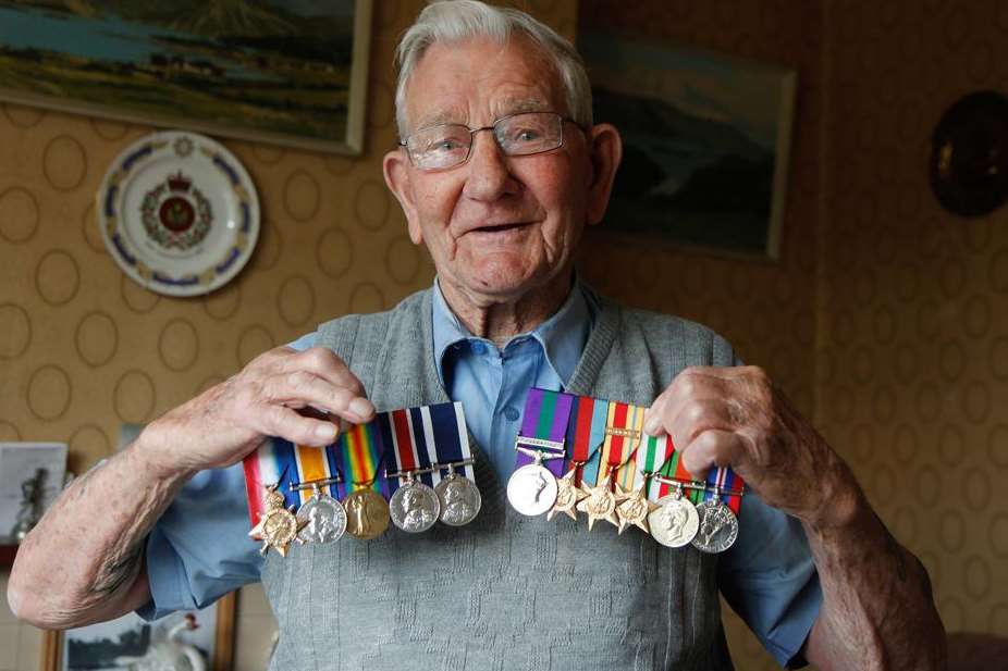 Leslie Stelfox with the war medals that have now been returned to him by police
