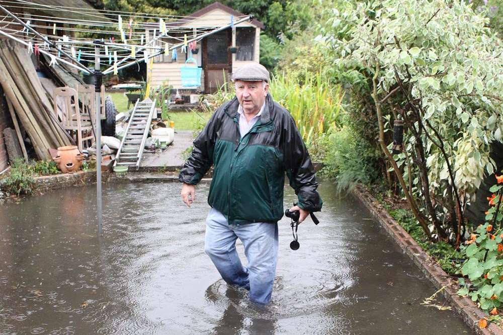 Bill Smith is angry about being waterlogged in two feet of water in his back garden
