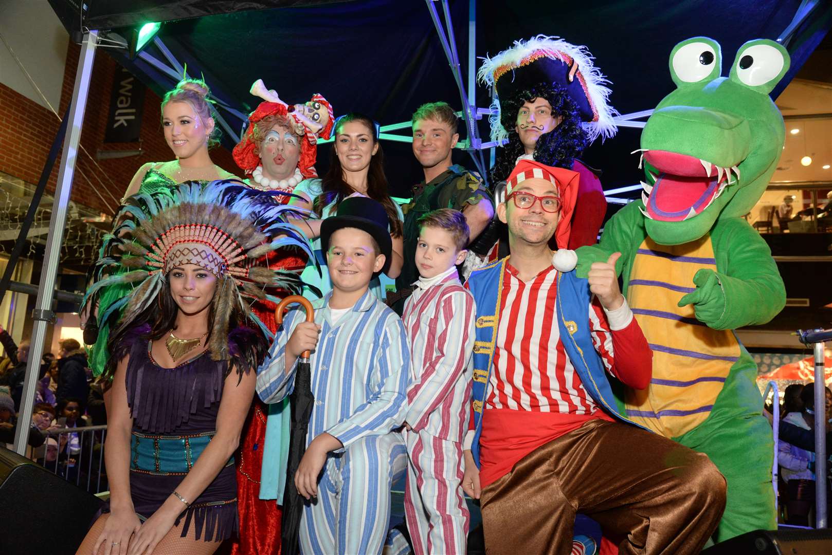 The cast of the Maidstone TV Studios panto Peter Pan arrive to help switch on the Fremlin Walk Christmas lights last year