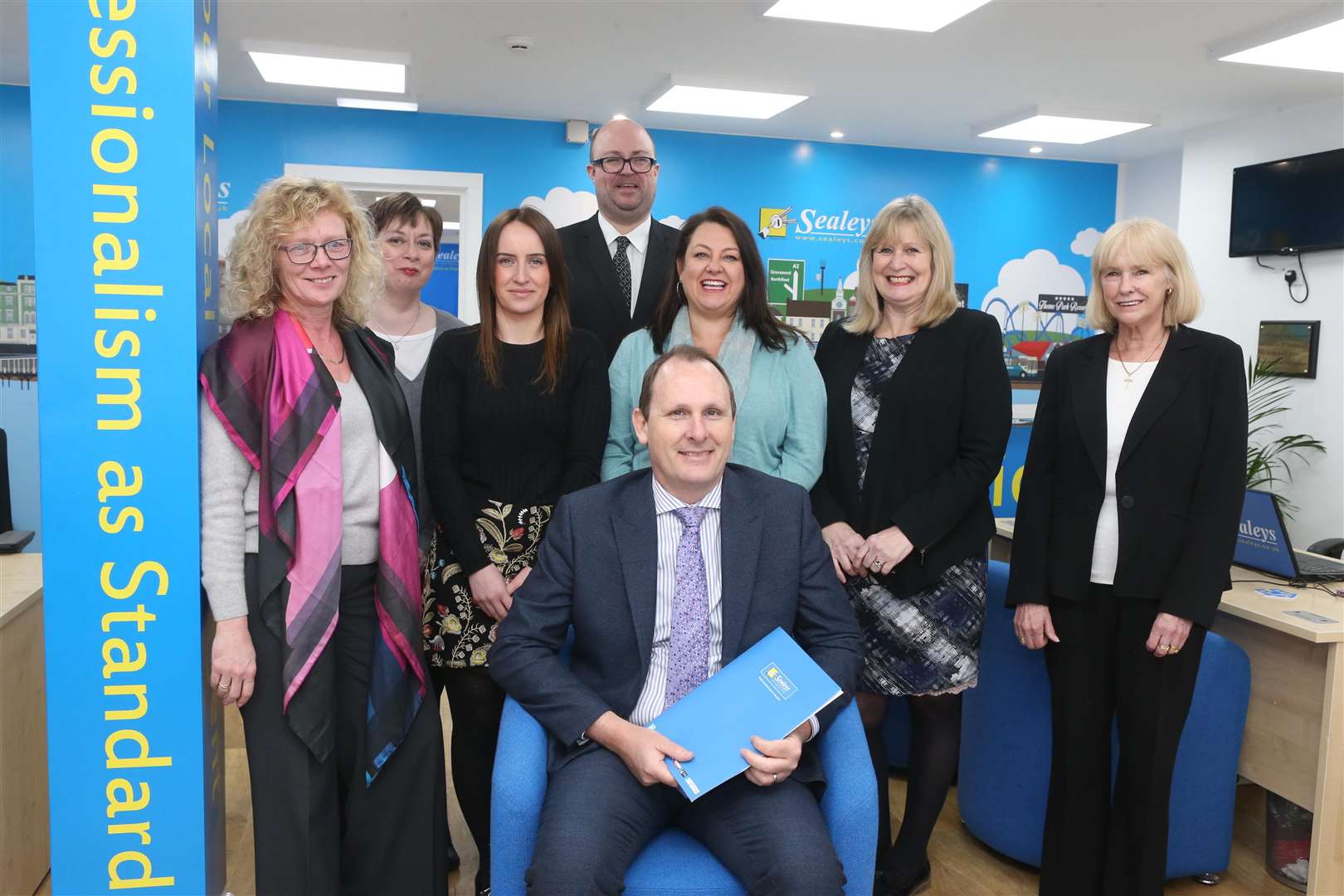 Michael Sears, Managing Director of Sealeys Estate Agents with his staff. Picture by: John Westhrop (1095067)