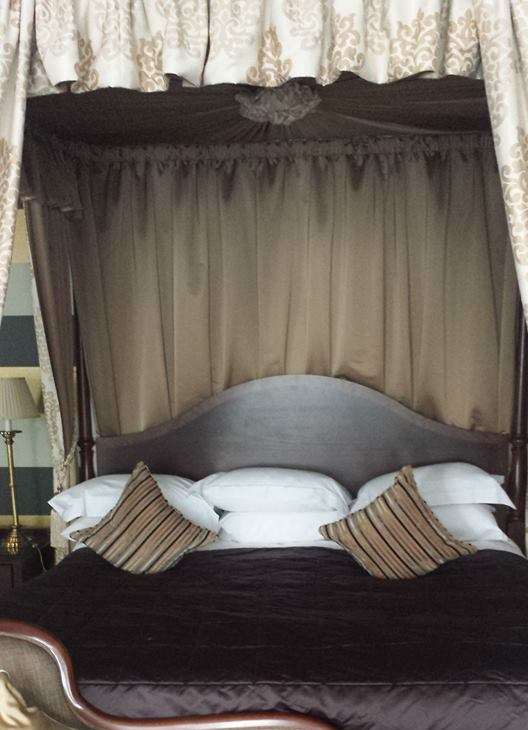 Four-poster bed at the Welcombe Spa Hotel in Stratford.